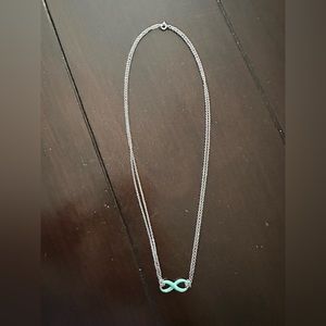 Tiffany & Co. Infinity necklace with enamel